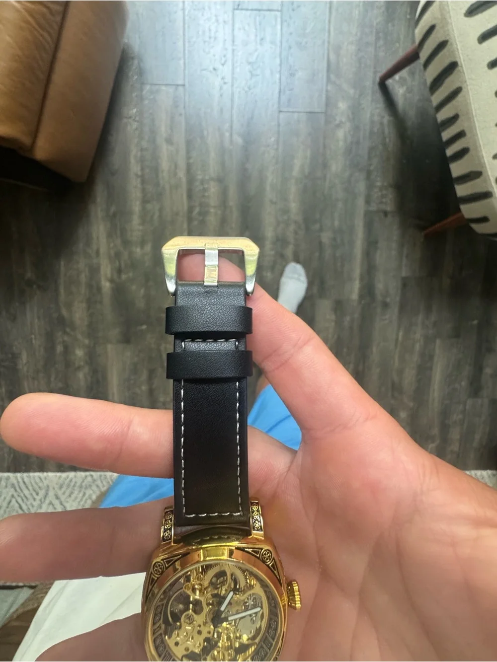 Gold Skeleton Mechanical Watch with Black Leather Strap